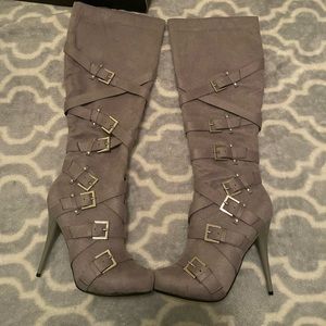 Super cute!! Gray zip up knee high, high heeled boots.